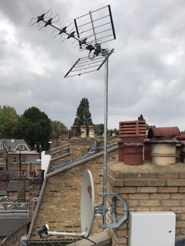 High gain Freeview TV aerial and 60cm satellite dish, installed on a chimney using a heavy duty cradle bracket.